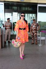 Urvashi Rautela dressed in a pink and orange floral dress spotted at airport on 14 Jun 2023 (9)_6489cf8685902.jpg