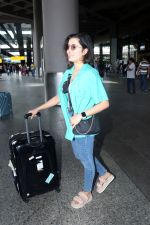 Shirley Setia dressed in blue jeans, camisole and teal shirt at the airport on 15 Jun 2023 (1)_648ae4fe86ad7.jpg