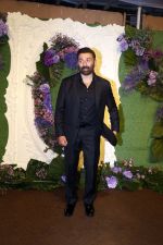 Sunny Deol Pose for media at the reception of Karan Deol and Drisha Acharya on 18 Jun 2023 (10)_6490675faa1be.jpeg