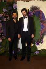 Sunny Deol and Rajveer Deol Pose for media at the reception of Karan Deol and Drisha Acharya on 18 Jun 2023 (5)_649067585202d.jpeg