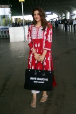 Nupur Sanon seen shinnig in red at the airport holding Saint Laurent handbag on 9 July 2023 (11)_64ac0911e9a70.jpg