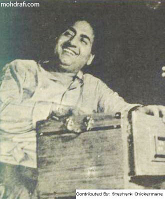 Mohd Rafi playing his harmonioum