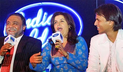 "Indian idol" Abhijeet Sawant looks on as CEO of Sony Entertainment Kunal Dasgupta and choreographer Farah Khan