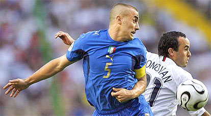 Italian defender Fabio Cannavaro (L) vies with US midfielder Landon Donovan