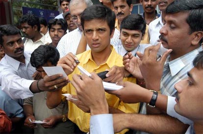 Newly Selected Indian cricket captain Rahul Dravid signs autographs
