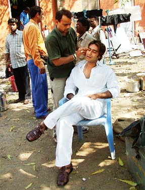 On the sets of Apaharan Ajay Devgan getting his makeup done