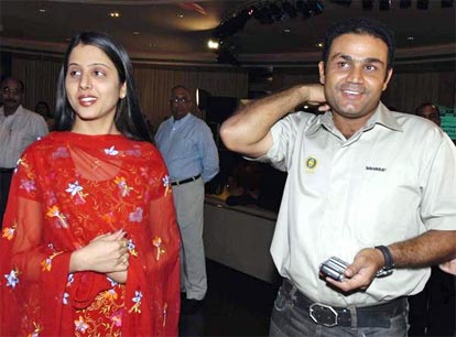 Virendra Sehwag is joined by his wife Arti