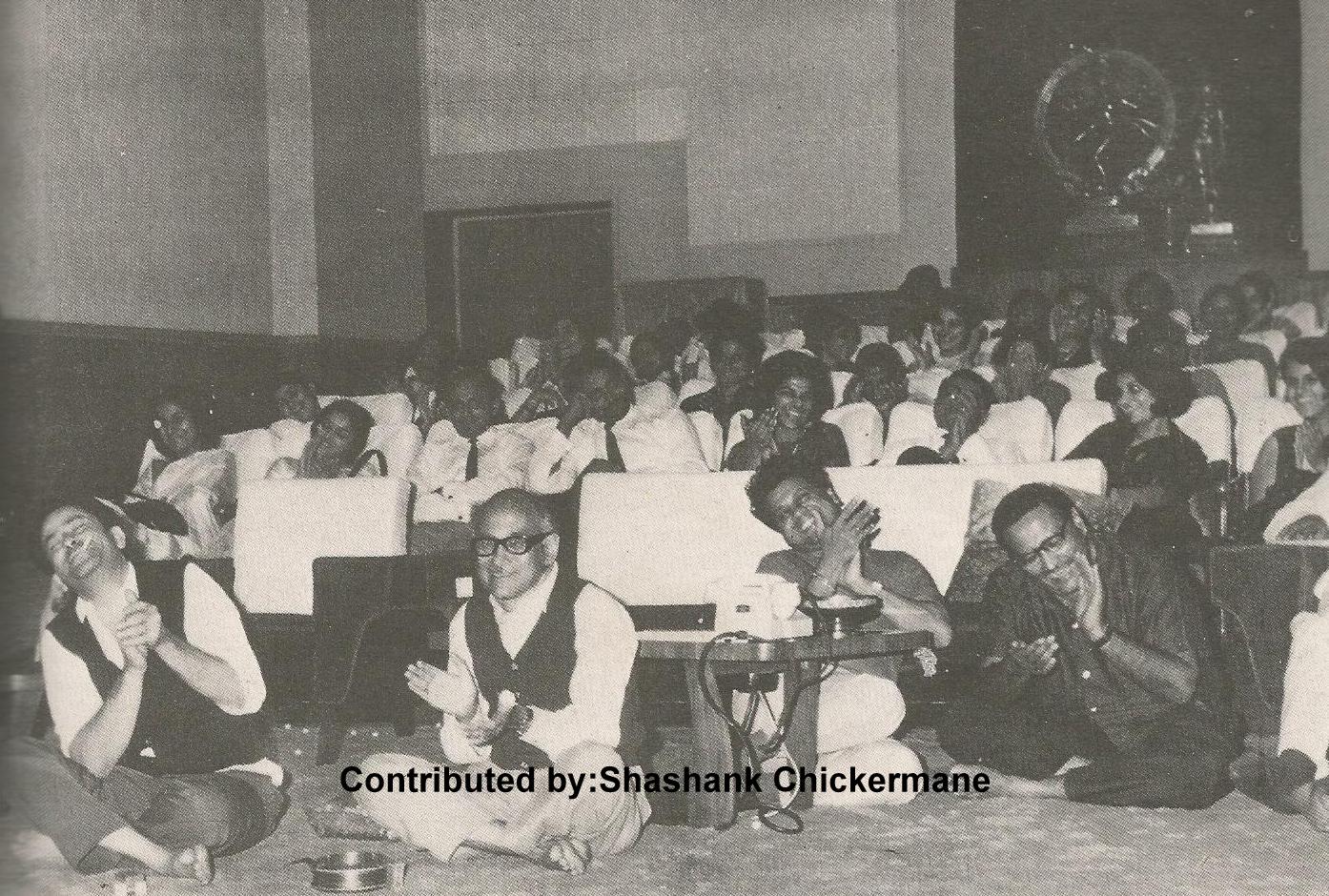 Raj Kapoor with K Abbas, Jaikishan, Bunny Reuben & others with others enjoying the film