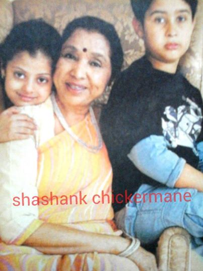 Asha with her grandchildren