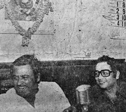 Kishoreda & Biswajeet laughing with a joke in the studio