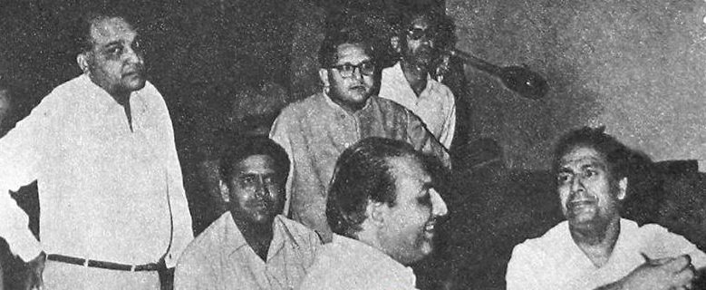 Mohd Rafi rehearsaling a song with Shankar & others in the recording studio