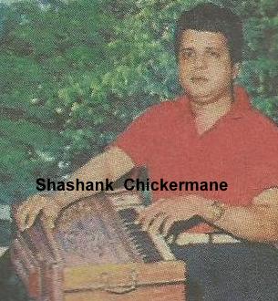 Jaikishan playing harmonium