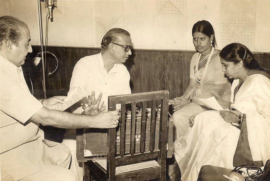 Mohdrafi with Asha Bhosale rehearsalling a song with others in the recording studio