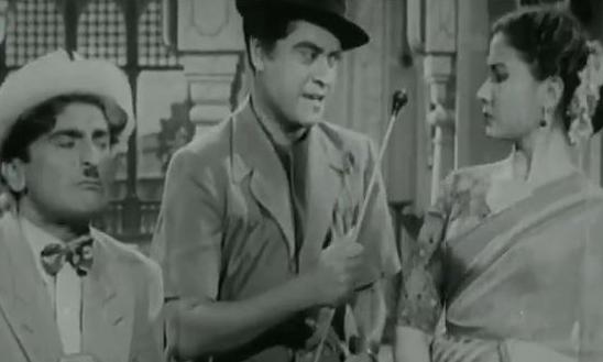 Kishoreda with Meena Kumar & others in the film scene