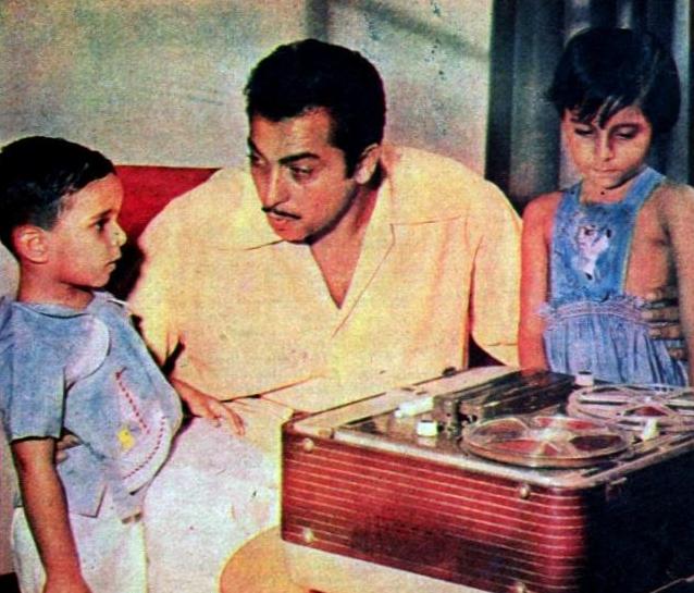 Madanmohan enjoying & listening songs alongwith his children