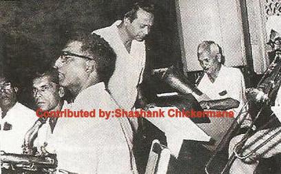 Naushad with his musicians in the recording studio