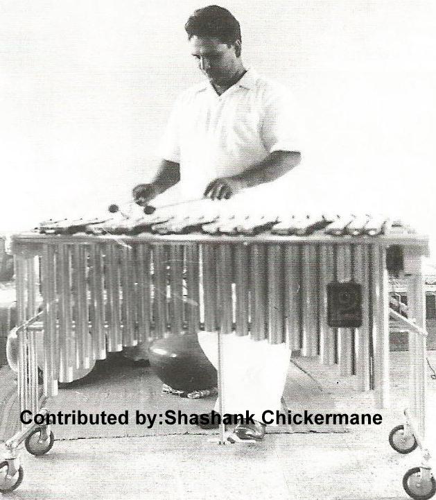 Shankar playing an instrument