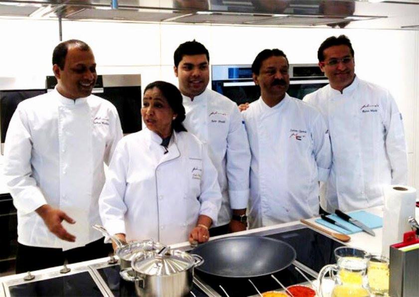 Asha Bhosale with a group of chef's in the hotel