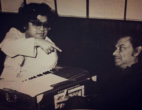 Kishoreda discussing with Bappida in the recording studio