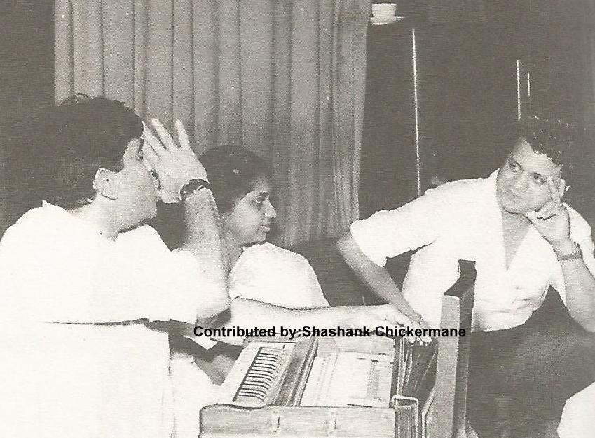 Raj Kapoor making joke with Jaikishan & Asha Bhosale in the recording studio