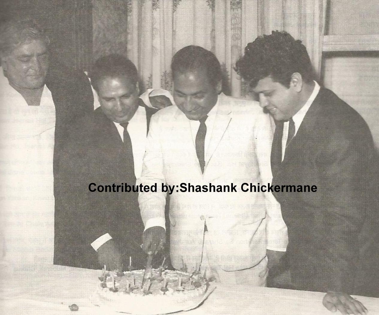 Mohd Rafi cutting a cake with Shankar Jaikishan & Prithviraj kapoor