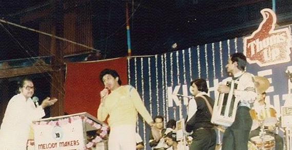 Kishore & Amit singing in a concert