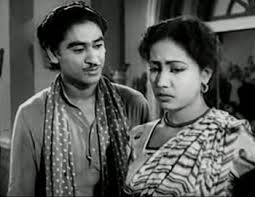 Kishoreda with Meena Kumari in a film scene