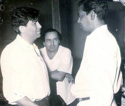 Raj Kapoor discussing with Shailendra, Mukeshji watching