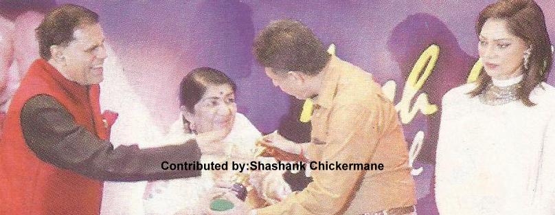Lata Mangeshkar discussing with Minister Tiwari and with Simi Gariwal