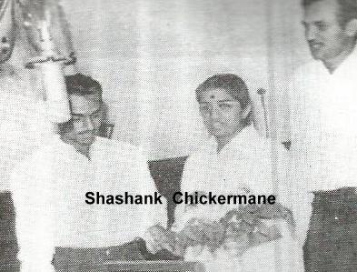 Lata recording a song with Kalyanji Anandji in the recording studio