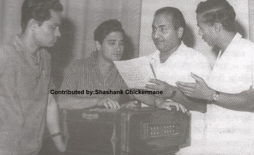 Mohd Rafi rehearsals a song with others in the recording studio