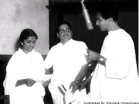 Mohdrafi and Lata Mangeshkar with music director in the recording studio