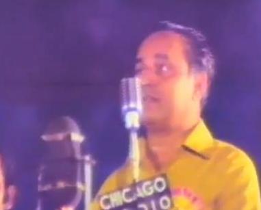 Mukesh singing in a concert