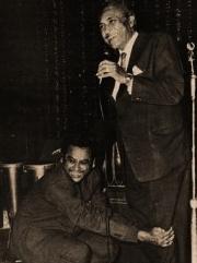 Kishorekumar take blessings from his elder brother Ashok Kumar in the stage show