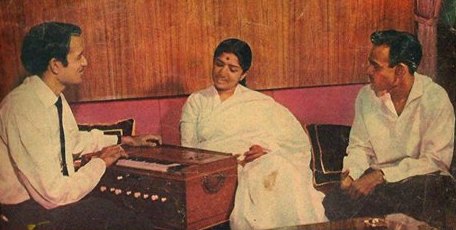 Lata rehearsalling a song with Kalyanji Anandji in the recording studio
