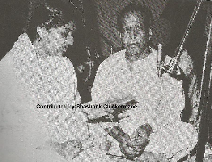 Lata with Pt Bhimshen Joshi recording a song in the recording studio