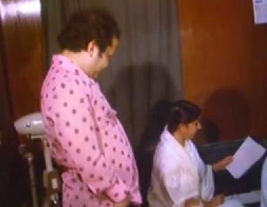 Lata rehearsals a song with Laxmikant in the recording studio