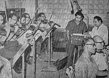 Kishoreda recording a song in the recording studio