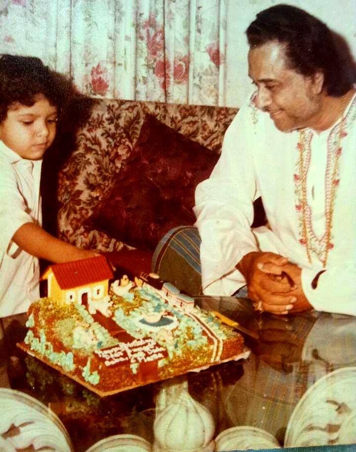 Kishoreda with his son Sumeet Kumar's birthday cake