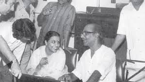 Salil Chowdhury discussing with others