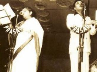 Lata with Bhupendra Hazarika singing in a concert