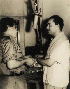 Mukesh recording a song with Jaikishan