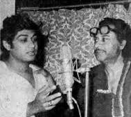 Kishorekumar & Amit Kumar recording a song
