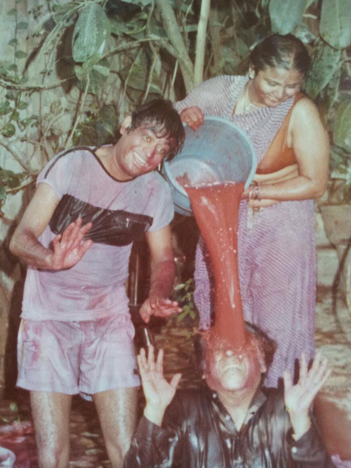 Kishore Kumar with wife Leena Chandavarkar and Amit Kumar playing Holi