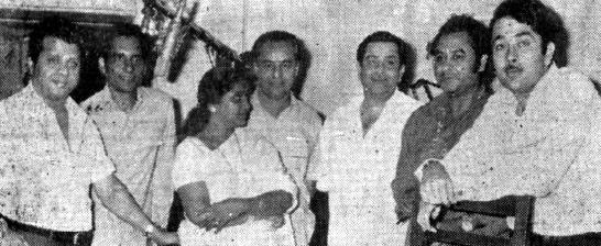 Kishore Kumar with Mukesh, Asha, Jaikishan, Randhir Kapoor, Raj Kapoor and others in a recording studio
