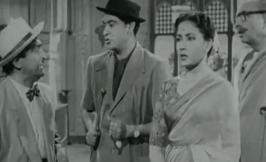 Kishoreda with Meena Kumar & others in the film scene