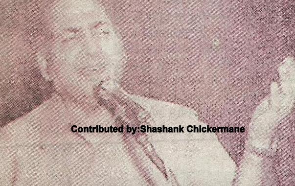Mohd Rafi singing in a concert
