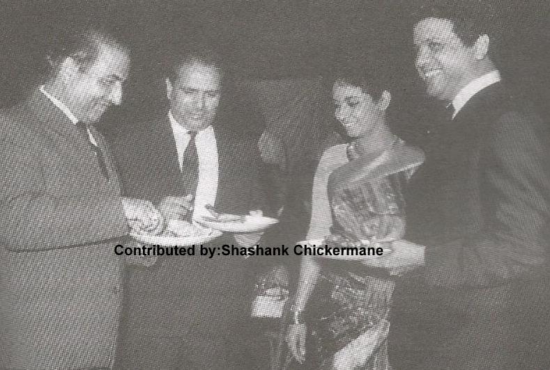 Mohd Rafi having dinner with Shankar Jaikishan & Sharda in a function