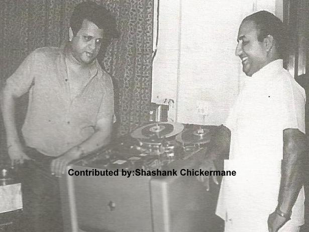 Mohd Rafi listening to his recorded song alongwith Jaikishan in the recording studio