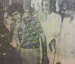 Kishore with his son Amit, Ashok kumar in a function 